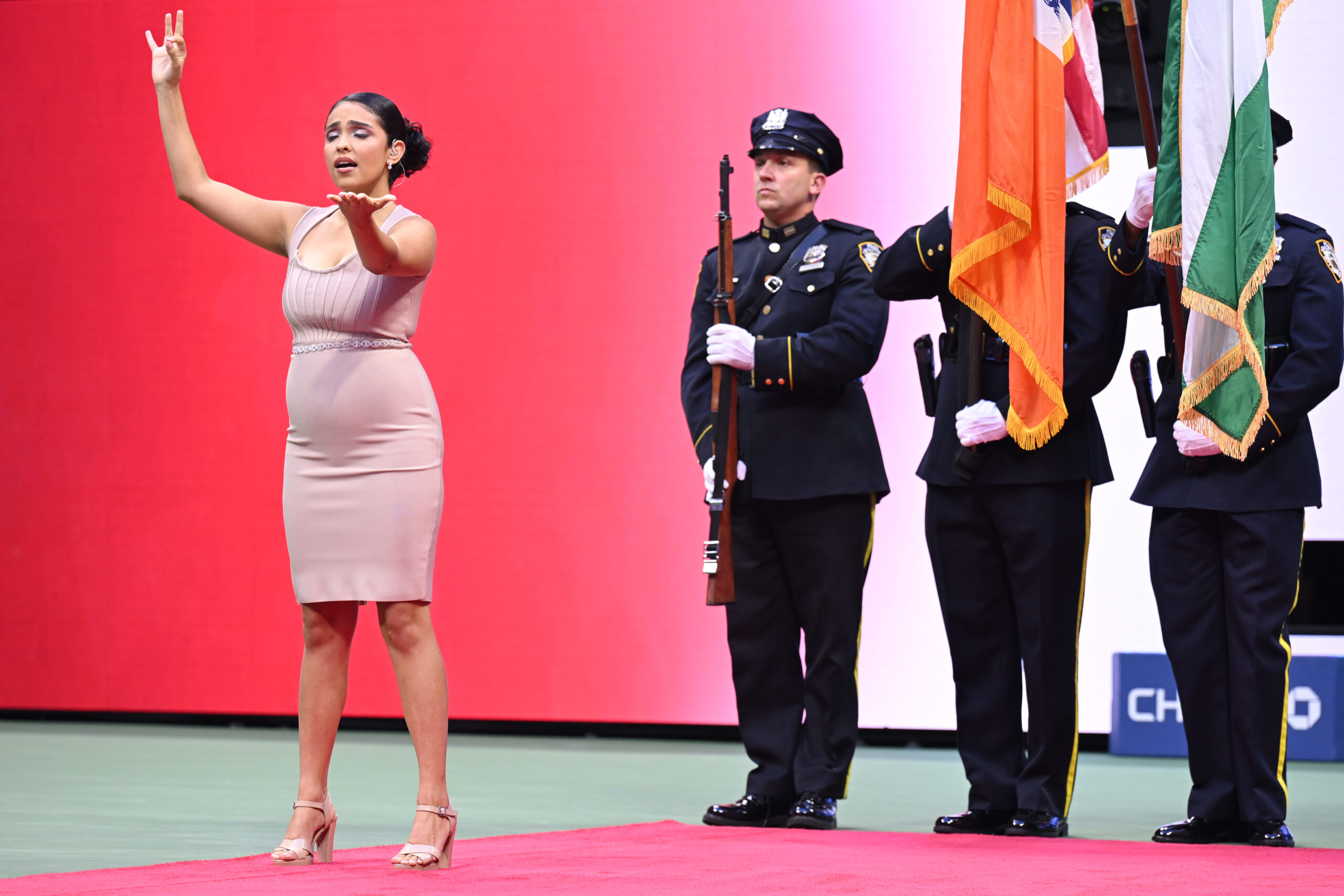 Anjel Piñero and Presentation of colors prior to a women's singles match on Opening Night at the 2024 US Open on Monday, Aug. 26, 2024 in Flushing, NY. (Simon Bruty/USTA)